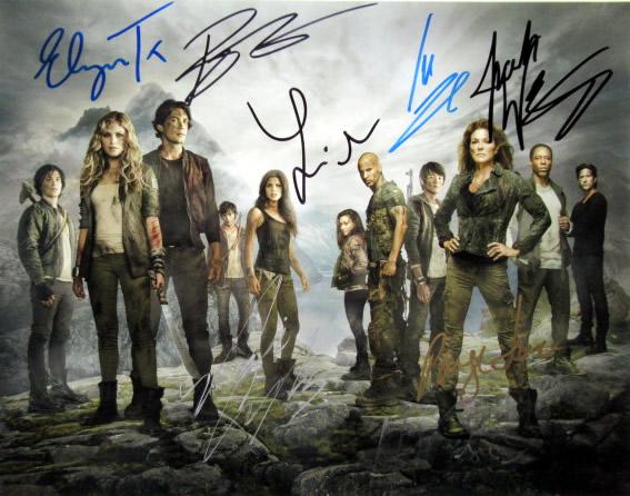 The 100 11x14 Cast Signed Photo: Photo size is 11 x 14. -- AMAZING in person signed Cast photo from the TV series THE 100. This is signed by Eliza Taylor, Marie Avgeropoulos, Bob Marley, Lindsay Morgan, Christopher Larkin, Paige Turc
