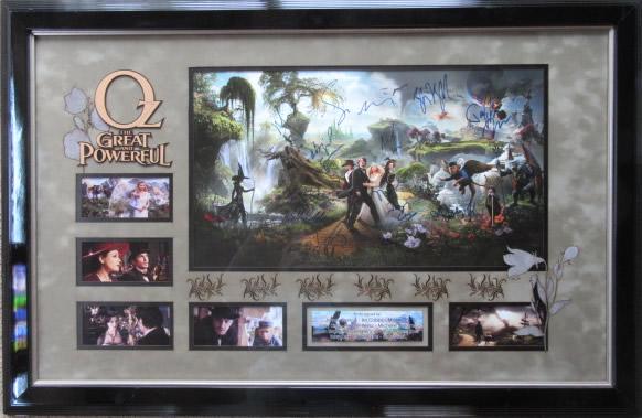 "OZ: GREAT & POWERFUL" Cast signed large photo - Custom: Description: Spectacular cast signed 11" x 19.5" image from "Oz: The Greatand Powerful" by everyone pictured; James Franco, Bill Cobbs, Mila Kunis, Joey King, Abigail Spencer, Bruce Campbell, Tony Cox