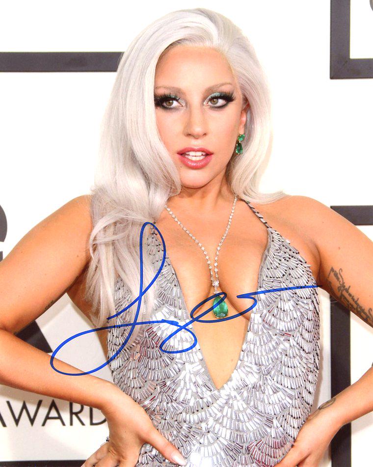 Lady Gaga POP SUPERSTAR In Person Signed Photo: Lady Gaga in person signed autographed photo. Besides being a pop icon superstar Lady Gaga has also been in movies such as A STAR IS BORN BORN, MACHETE KILLS, and SIN CITY. Photo size is 8 x 10