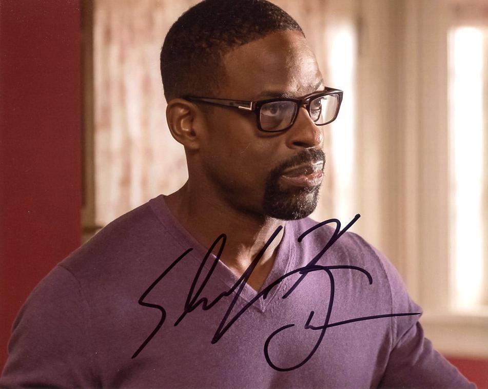 Stirling K Brown THIS IS US In Person Signed Photo: Sterling K Brown in person signed autographed photo from the TV series THIS IS US. Sterling K Brown as the character Randall Pearson. Photo size is 8 x 10