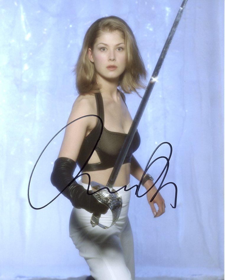 Rosamund Pike DIE ANOTHER DAY In Person Signed Photo: Rosamund Pike in person signed autographed photo from the James Bond movie DIE ANOTHER DAY. Rosamund Pike as the character Miranda Frost. Photo size is 8 x 10