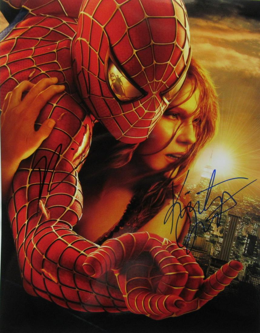 Tobey Maguire / Kirsten Dunst SPIDERMAN 11x14 In Person: Tobey Maguire / Kirsten Dunst in person signed autographed photo from the movie SPIDERMAN. Tobey Maguire as the character Peter Parker / Spiderman. Kirsten Dunst as the character Mary Jane Watson. Pho