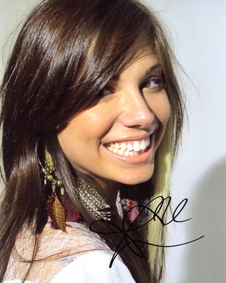 Christina Perri SINGER In Person Signed Photo: Christina Perri in person signed autographed photo. Christina Judith Perri is an American singer and songwriter. After her debut single "Jar of Hearts" was featured on the television series So You Thi