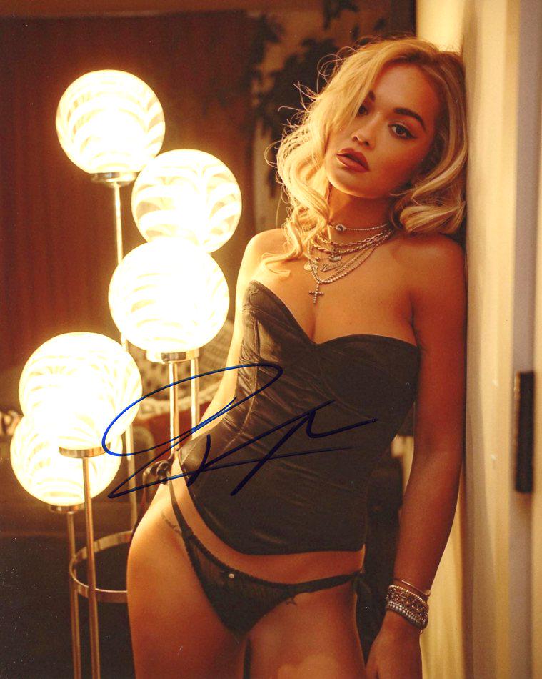 Rita Ora SEXY In Person Signed Photo: Rita Ora In person signed autographed photo. Rita Ora is a British singer and actress. She rose to prominence in February 2012 when she featured on DJ Fresh's single "Hot Right Now", which reached num