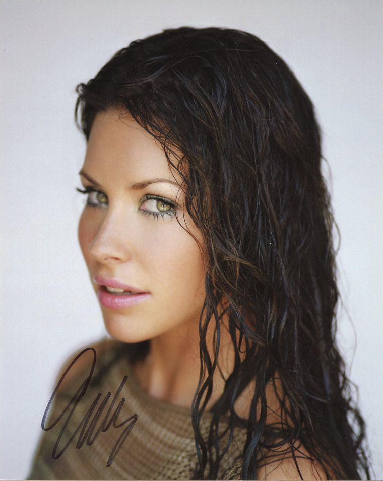 Evangeline Lilly GORGEOUS In Person Signed Photo: Evangeline Lilly in person signed autographed photo. Evangeline Lilly has been in such TV and movies as LOST, ANT-MAN AND THE WASP, and THE HOBBIT