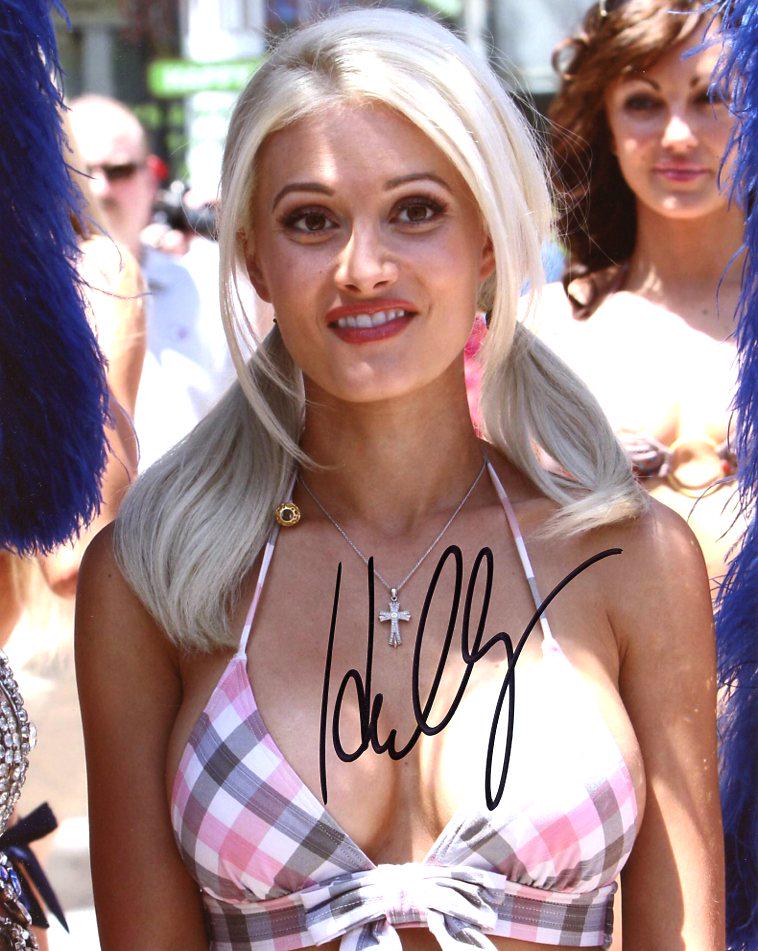 Holly Madison PLAYBOY In Person Signed Photo: Holly Madison in person signing autographed photo. Holly Madison is best known for her role in PLAYBOYS THE GIRLS NEXT DOOR