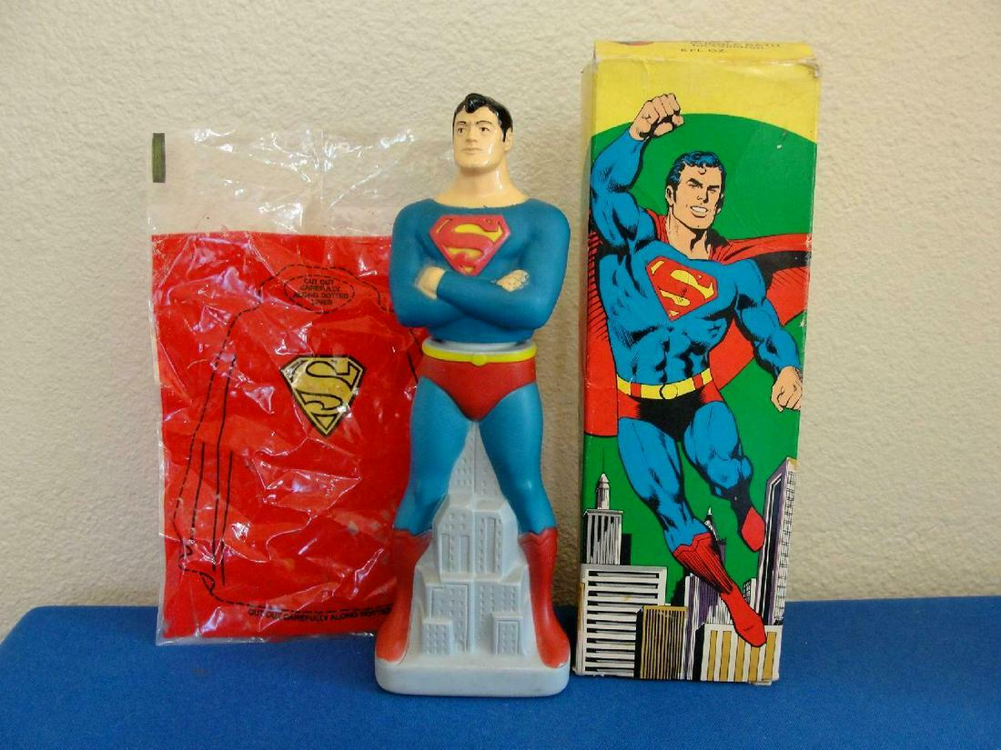 Vintage 1978 Superman DC Comics Action Figure Stand: RARE to see this still with the cape!! Vintage 1978 Superman DC Comics Action Figure Stand Avon Soap Bubble Bath Bottle. Empty decanter Superman Bubble Bath Bottle with his red plastic cape. Decanter