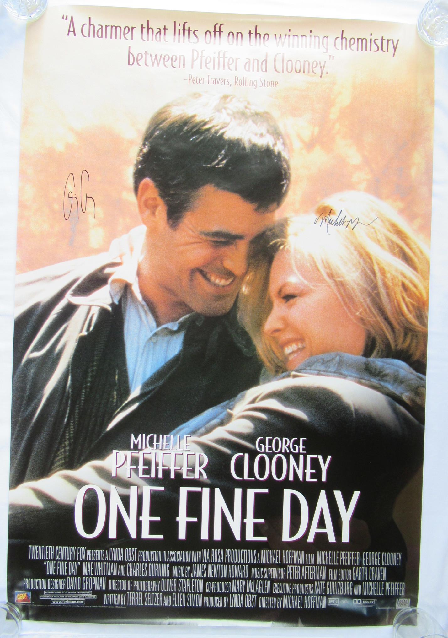 Michelle Pfiefer / George Clooney Signed ONE FINE DAY: 1996 ONE FINE DAY MOVIE POSTER signed by BOTH Michelle Pfieffer and George Clooney. Measures 27 x 40 inches, minor edge & corner wear, bright & clean, clean backside.