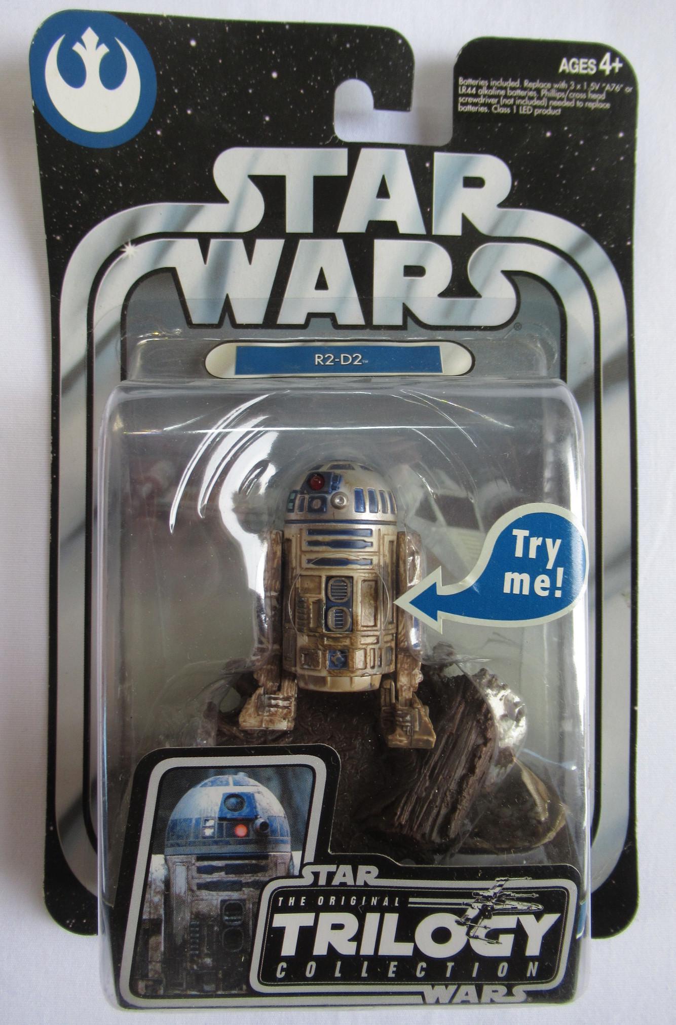 2004 STAR WARS ORIGINAL TRILIOGY R2-D2 MOC: Star Wars Origional Trilogy Collection R2-D2 2 1/2" Action Figure. Mint on Card, Sealed, bends on card, crease on bottom corner, Released by Hasbro in 2004