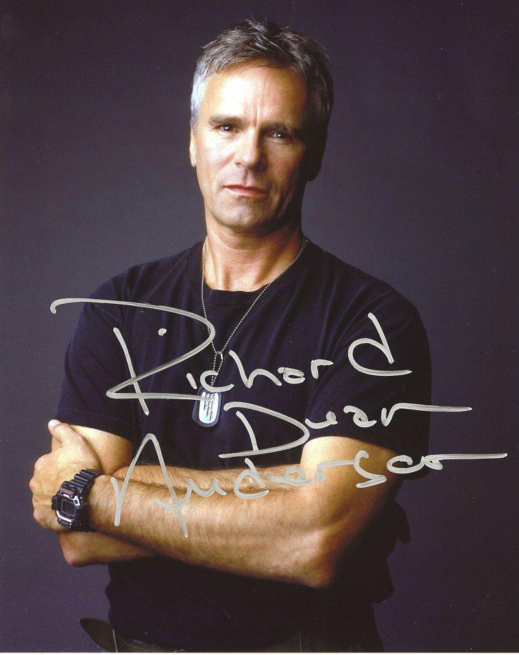 Richard Dean Anderson STARGATE In Person Signed Photo -: This was from a EB Autographs private signing. Richard Dean Anderson in person signed photo from the TV series STARGATE. Richard Dean Anderson as the character Col. Jack O'Neill