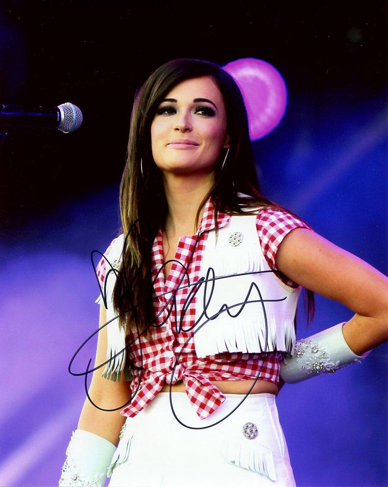 Kacey Musgraves COUNTRY SUPERSTAR In Person Signed: Kacey Musgraves in person signed autographed photo. Kacey Musgraves is an American singer and songwriter. She has won six Grammy Awards, six Country Music Association Awards, and three Academy of Coun