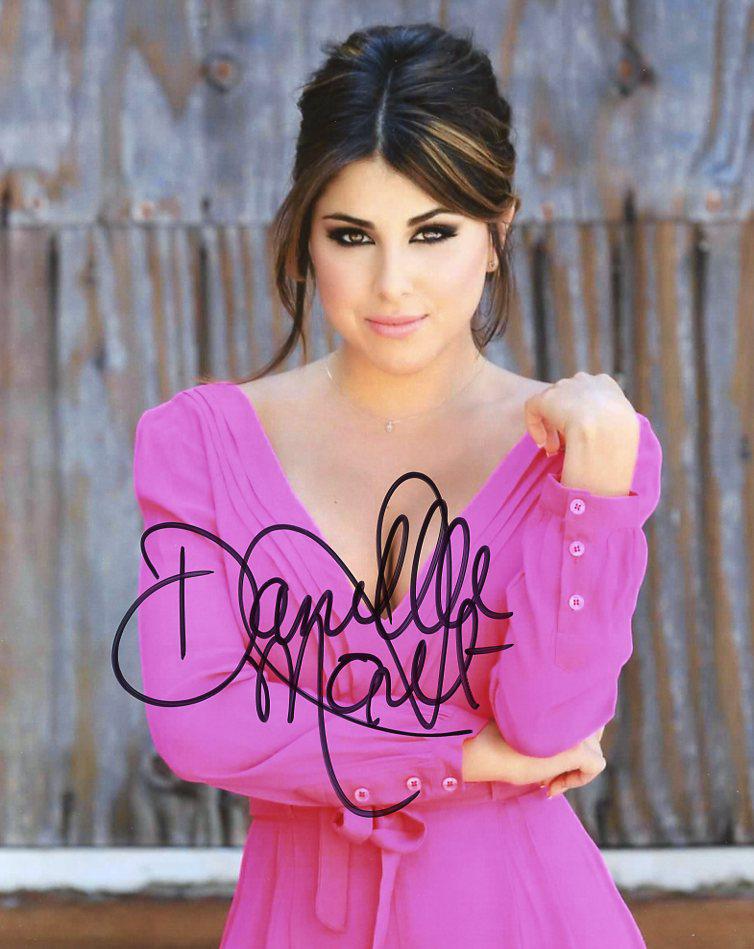 Danielle Monet VICTORIOUS In Person Signed Photo: Photo size is 8 x 10. Daniella Monet in person signed autographed photo from the TV series VICTORIOUS. Daniella Monet as the character Trina Vega