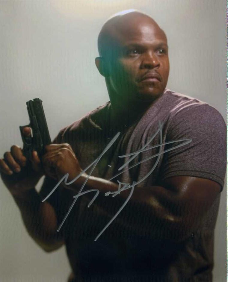 IronE Singleton THE WALKING DEAD In Person Signed Photo: Photo size is 8 x 10. Nice in person signed photo from the TV series THE WALKING DEAD