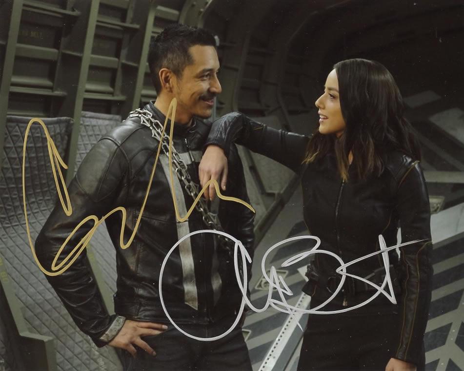 Chloe Bennet / Gabriel Luna AGENTS SHIELD In Person: Photo size is 8 x 10. Chloe Bennet / Gabriel Luna in person signed photo from the TV series AGENTS OF SHIELD. Chloe Bennet as the character Daisy "Skye" Johnson. Gabriel Luna as the character Ghost Ri