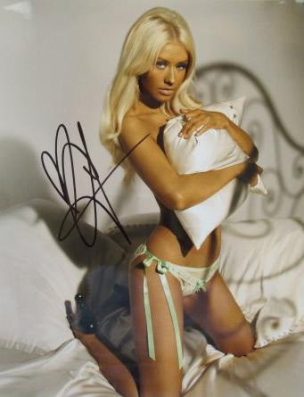 Christina Aguilera SEXY In Person Signed Photo 11x14: Photo size is 11 x 14. Christina Aguilera in person signed autographed photo. Christina Aguilera is an American singer, songwriter, actress, and television personality. Her accolades include five Gram