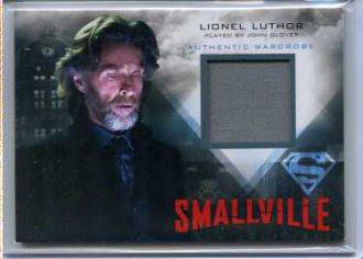John Glover Smallville NonSport Card Swatch: From Cryptozoic Cards. Card #M25. Piece of authentic wardrobe containing a piece of LIONEL LUTHOR Grey Dress Shirt worn by John Glover in the filming of Smallville.