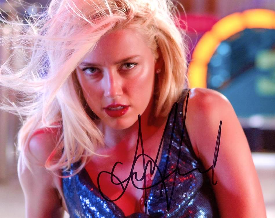 Amber Heard MACHETE KILLS In Person Signed Photo: Photo size is 8 x 10. Amber Heard in person signed autographed photo from the movie MACHETE KILLS. Amber Heard as the character Miss. San Antonio