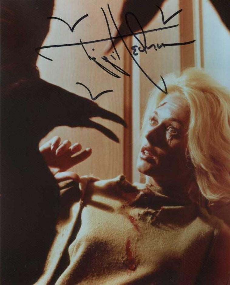 Tippi Hedren THE BIRDS IN Person Signed Photo: Photo size is 8 x 10. Tippi Hedren in person signed autographed photo from the movie THE BIRDS. Tippy Hedren as the character Melanie Daniels