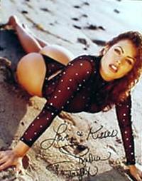 Sandra Taylor SEXY In Person Signed Photo: Photo size is 8 x 10. This was from a Ed Bedrick Autographs Private Signing. Sexy in person signed photo laying on beach