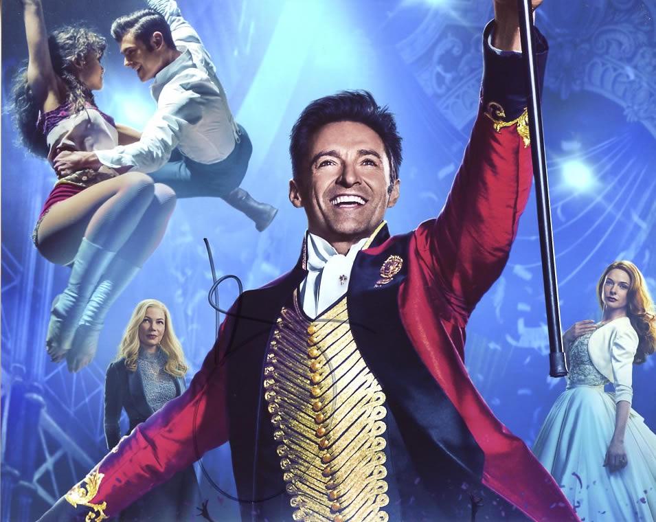 Hugh Jackman WORLDS GREATEST SHOWMAN In Person Signed: Photo size is 8 x 10. Hugh Jackman in person signed autographed photo from the movie THE WORLD'S GREATEST SHOWMAN. Hugh Jackman as the character PT Barnum