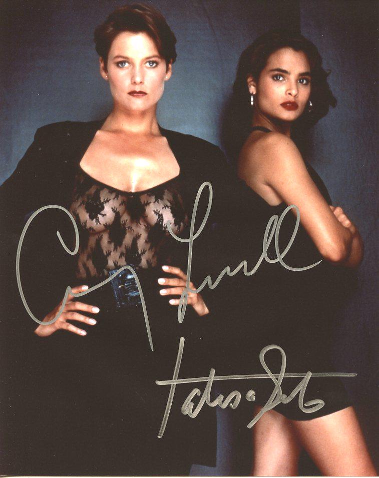 Carey Lowell / Talisa Soto LICENSE TO KILL Signed Photo: Carey Lowell / Talisa Soto in person signed autographed photo from the James Bond movie LICENSE TO KILL. Carey Lowell as character Pam Bouvier and Talisa Soto as the character Lupe Lamora
