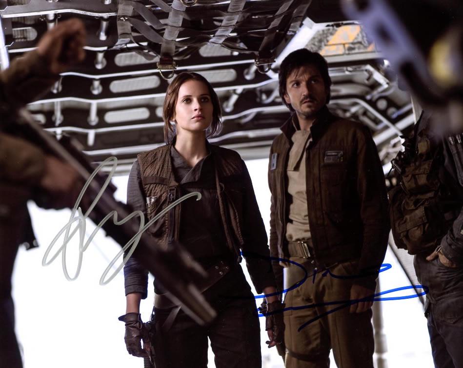Felicity Jones / Diego Luna SW ROGUE ONE Signed Photo: Felicity Jones / Diego Luna in person signed autographed photo from the movie STAR WARS ROGUE ONE. Felicity Jones as the character Jyn Erso. Diego Luna as the character Capt. Cassian Andor.