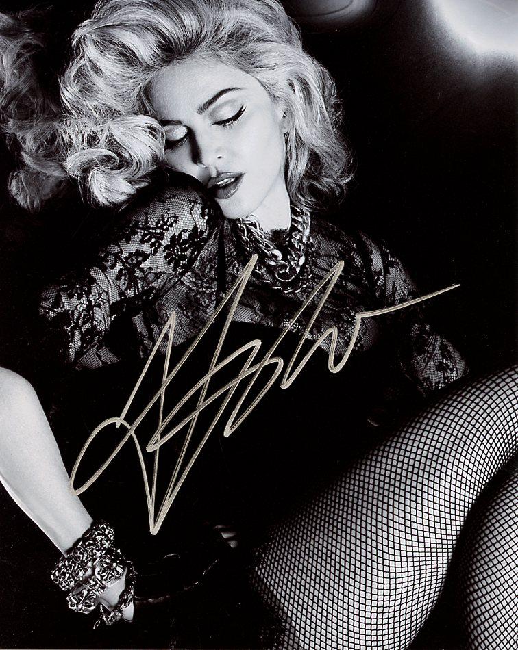Madonna MUSIC SUPER STAR Signed Photo: Madonna in person signed autographed photo. Madonna Louise Ciccone is an American singer, songwriter, and actress. Referred to as the "Queen of Pop", she is regarded as one of the most influential fig
