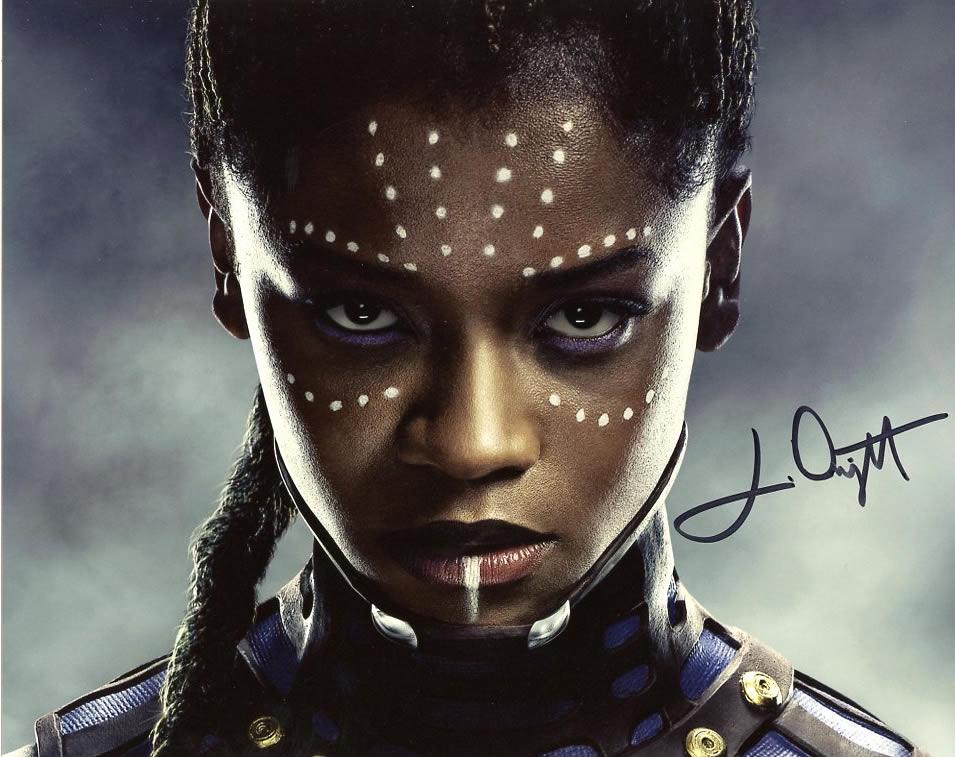 Letita Wright BLACK PANTHER In Person Signed Photo: Letita Wright in person signed autographed photo from the movie BLACK PANTHER. Letita Wright As the character Shuri.