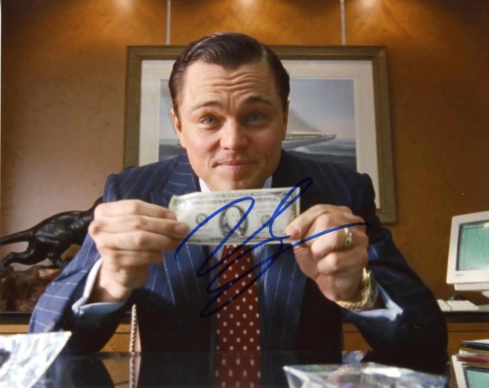 Leonardo DiCaprio WOLF OF WALL STREET In Person Signed: Leonardo DiCaprio in person signed autographed photo from the movie THE WOLF OF WALL STREET. Leonardo DiCaprio as the character Jordan Belfort.