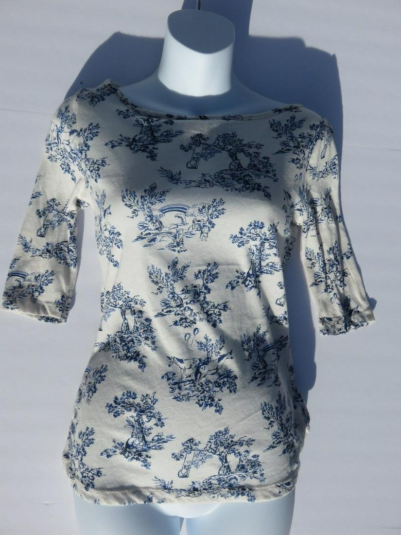 Anna Paquin 'True Blood' Screen Worn Top: Original Wardrobe from the HBO series TRUE BLOODSookie Stackhouse Season 7 / Episode 1 Cream / blue toile top with 3/4 sleevesTag attached with show code TB for TRUE BLOOD