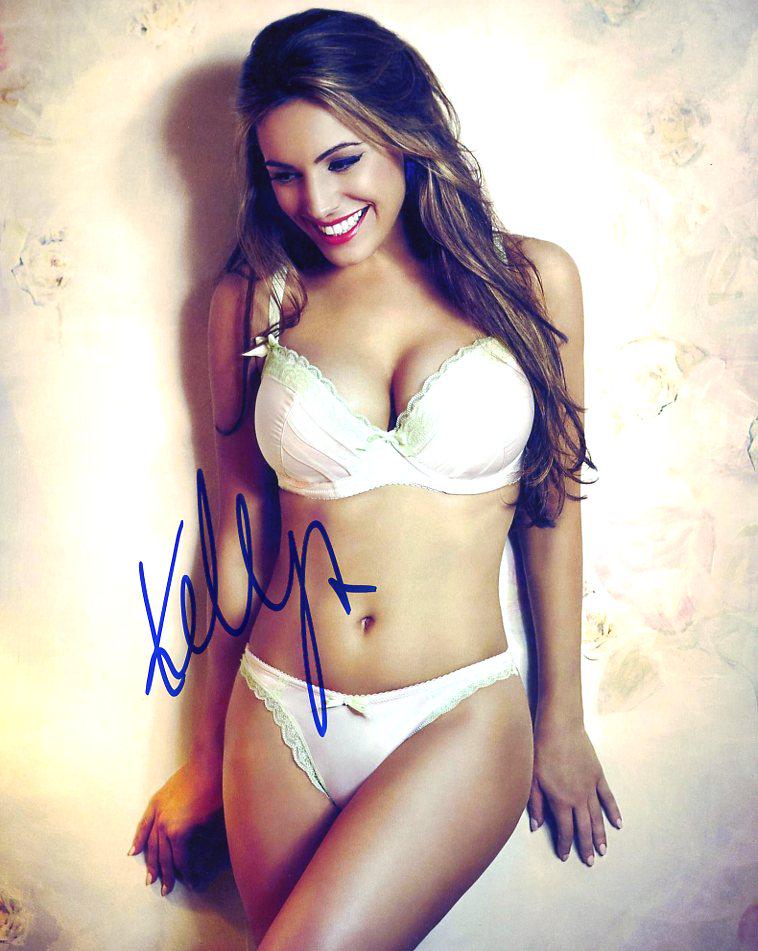 Kelly Brook MODEL In Person Signed Photo: Kelly Brook sexy in person signed autographed photo. Kelly Brook has done such TV and movies as THE ITALIAN JOB, ONE BIG HAPPY, and LOVE ADVENT