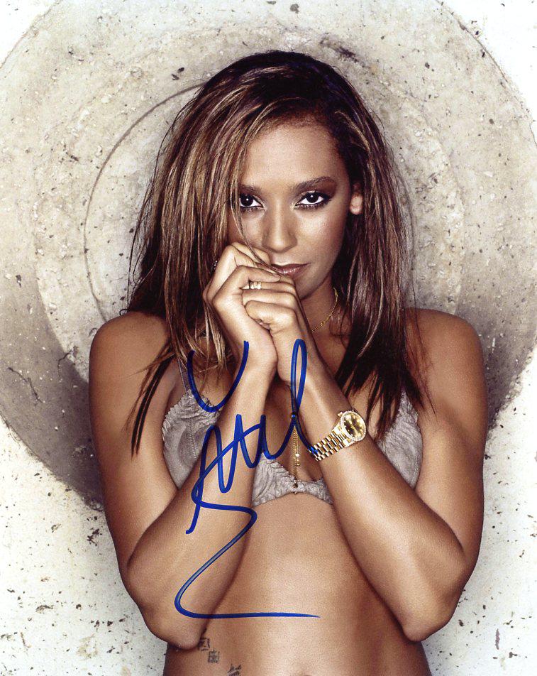 Melanie Brown SEXY In Person Signed Photo: Melanie Brown in person signed autographed photo. Melanie Brown, known professionally as Mel B, is an English singer, songwriter, rapper, television personality, actress, and model. She rose to promin