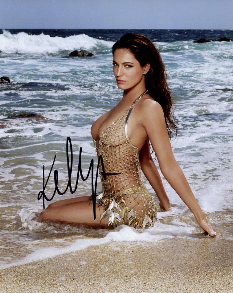Kelly Brook SEXY In Person Signed Photo: Kelly Brook sexy in person signed autographed photo. Kelly Brook has done such TV and movies as THE ITALIAN JOB, ONE BIG HAPPY, and LOVE ADVENT
