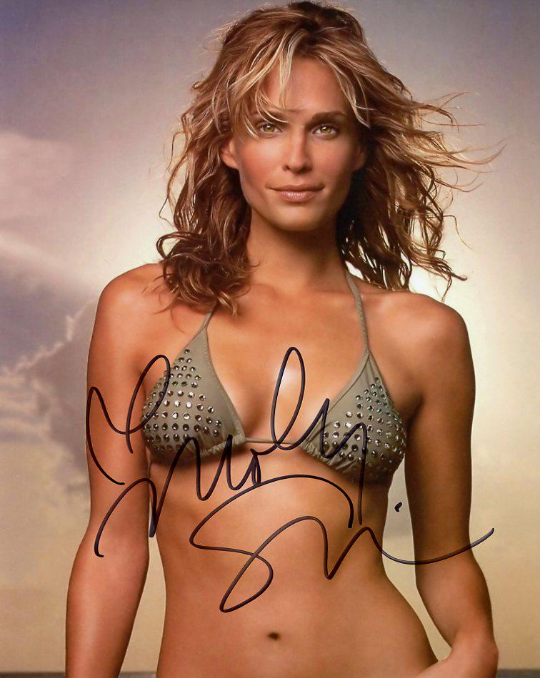 Molly Sims SEXY In Person Signed Photo: Molly Sims in person signed autographed photo. Molly Sims is an American fashion model and actress. She has been featured in campaigns by a number of major brands, including Jimmy Choo, Escada, Giorgi