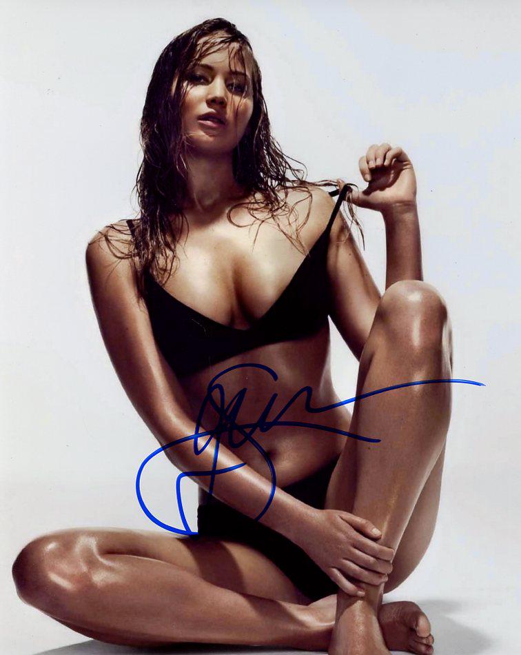 Jennifer Lawrence SEXY In Person Signed Photo: Jennifer Lawrence - in person signed autographed photo. Jennifer Lawrence has starred in such blockbuster hits such as THE HUNGER GAMES, SILVER LININGS PLAYBOOK, AMERICAN HUSTLE, X-MEN MOVIES.