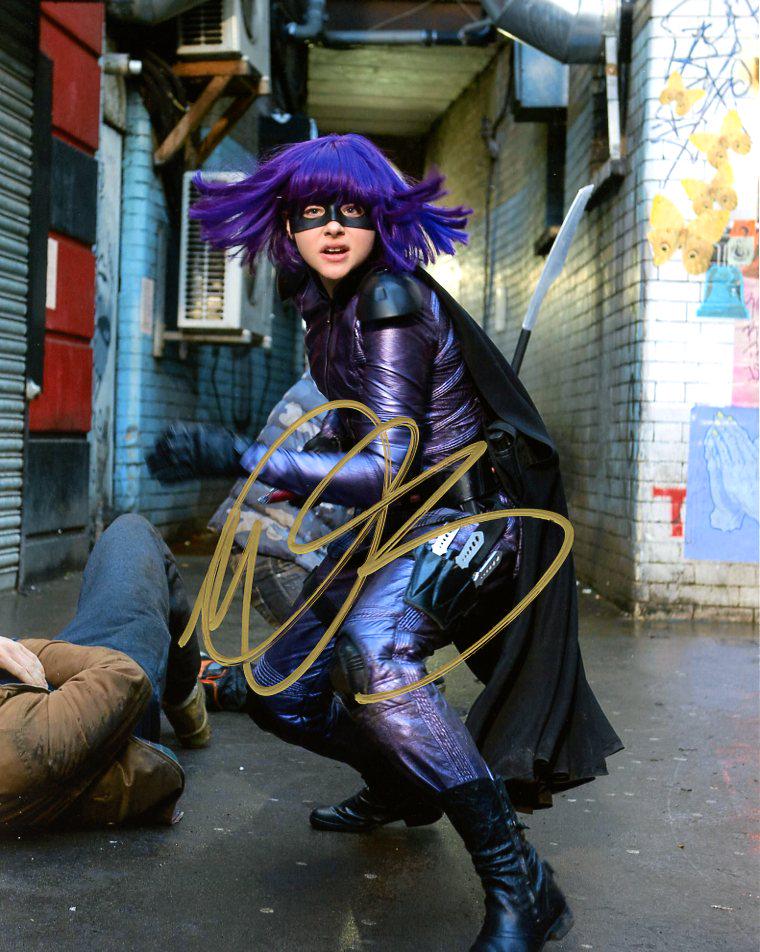Chloe Grace Moretz KICK ASS 2 In Person Signed Photo: Chloe Grace Moretz in person signed autographed photo from the movie KICK ASS 2. Chloe Grace Moretz as the character Mindy McCready / Hit Girl.