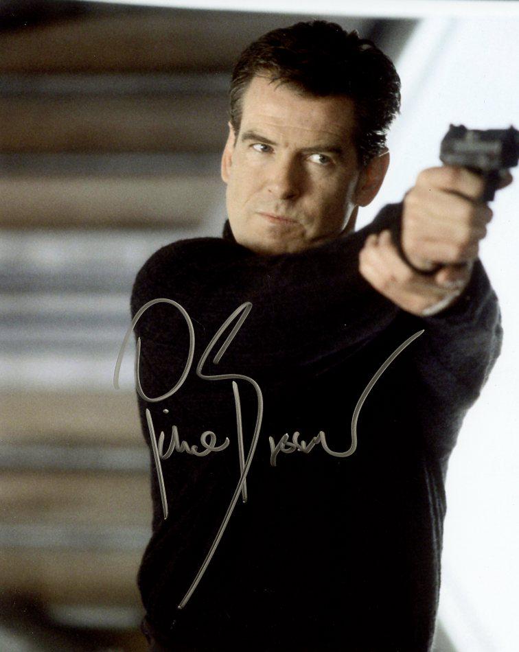 Pierce Brosnan JAMES BOND 007 In Person Signed Photo: Pierce Brosnan in person signed autographed photo. Pierce Brosnan as the character agent 007 James Bond.