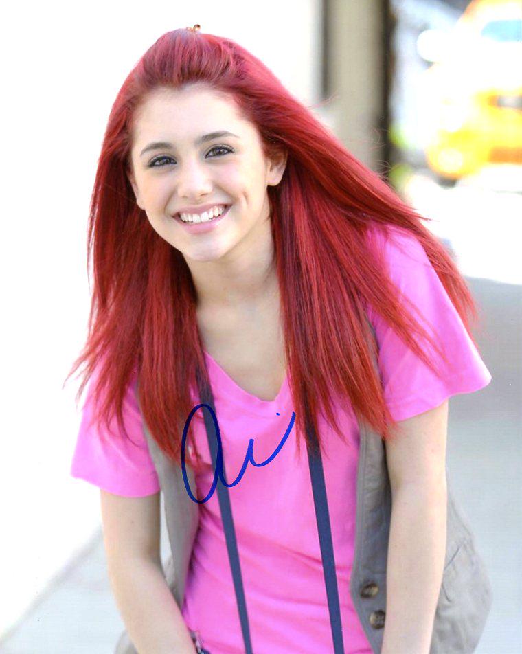 Ariana Grande PRETTY Signed Photo: Ariana Grande in person signed autographed photo. Ariana Grande has starred in such TV shows as VICTORIOUS, SAM AND CAT, SCREEN QUEENS. Besides being a singing sensation.