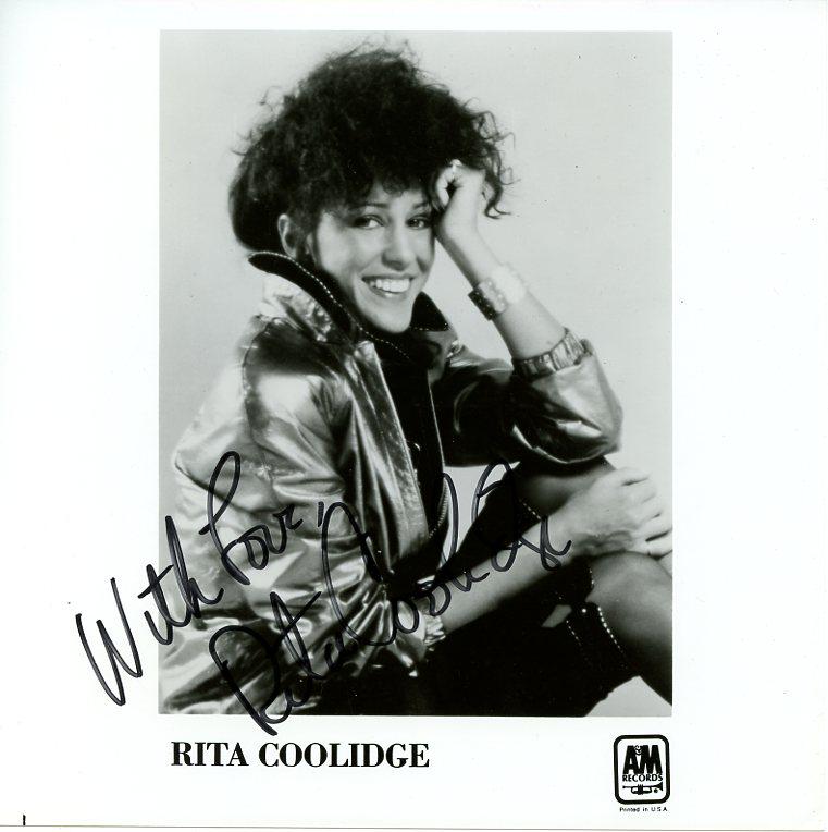 Rita Coolidge SINGER Signed Photo: PLEASE NOTE; Photo size is 8x8. Rita Coolidge signed autographed photo. Rita Coolidge is an American recording artist. During the 1970s and 1980s, her songs were on Billboard magazine's pop, country, 