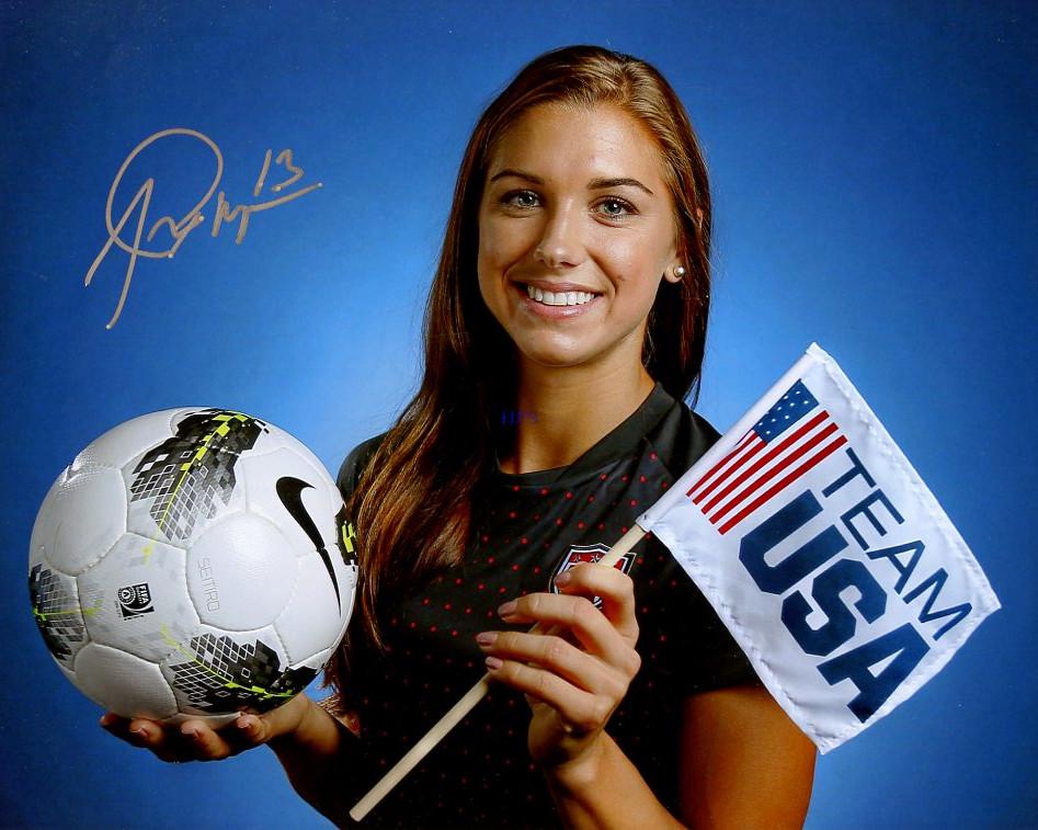 Alex Morgan SOCCER In Person Signed Photo: Alex Morgan in person signed autographed photo. Alexandra Morgan Carrasco is an American professional soccer player for the Orlando Pride of the National Women's Soccer League, the highest division of