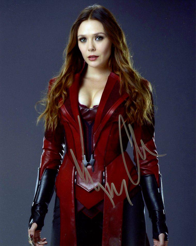 Elizabeth Olsen AVENGERS AGE OF ULTRON IP Signed Photo: Elizabeth Olsen in person signed autographed photo from the movie AVENGERS AGE OF ULTRON. Elizabeth Olsen as the character Wanda Maximoff / Scarlet Witch