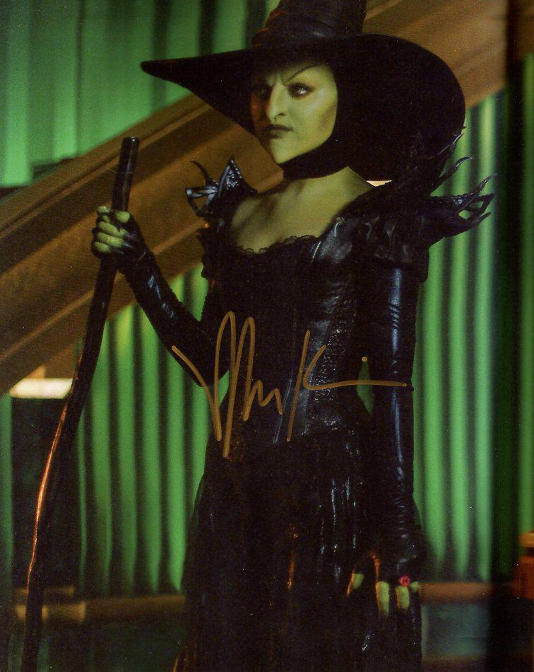 Mila Kunis OZ GREAT & POWERFUL In Person Signed Photo: Mila Kunis in person signed autographed photo from the movie OZ THE GREAT AND POWERFUL. Mila Kunis as the character Theodora / Wicked Witch of the west.