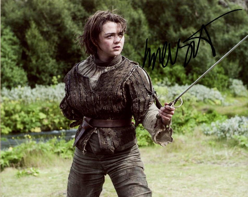 Maisie Williams GoT In Person Signed Photo: Maisie Williams in person signed autographed photo from the HBO series GAME OF THRONES. Maisie Williams as the character Arya Stark.