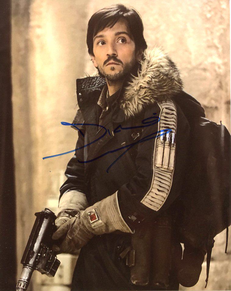 Diego Luna SW ROGUE ONE In Person Signed Photo: Diego Luna in person signed autographed photo from the movie STAR WARS ROGUE ONE. Diego Luna as the character Capt. Cassian Andor.