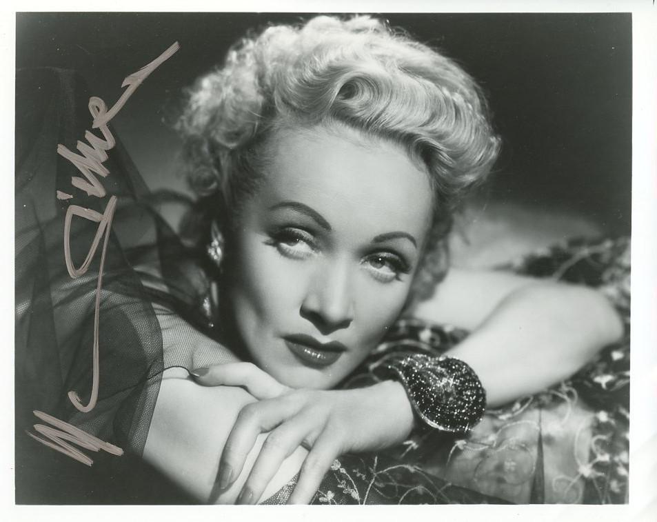 Marlene Dietrich (1901-1992) BEAUTIFUL Signed Photo: Photo size is 8x10. Marlene Dietrich (1901-1992) was a German-born American actress and singer. Her career spanned from the 1910s to the 1980s. In 1920s Berlin, Dietrich performed on the stage and in 