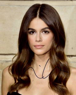 Kaia Gerber MODEL In Person Signed Photo: Photo size is 8x10. Kaia Gerber in person signed autographed photo. Kaia Gerber is an American model and actress. She is the daughter of model Cindy Crawford and businessman Rande Gerber. After