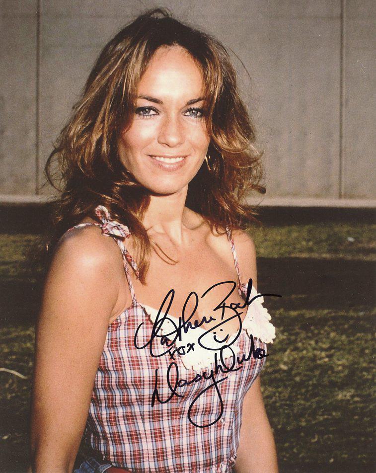 Catherine Bach DUKES OF HAZZARD In Person Signed Photo: Photo size is 8 x 10. Catherine Bach in person signed autographed photo from the TV series THE DUKES OF HAZZARD. Catherine Bach as the character Daisy Duke.