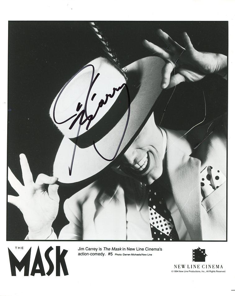 Jim Carrey THE MASK Signed Photo: Photo size is 8 x 10. Jim Carrey signed press still from the movie THE MASK. Jim Carrey as the character The Mask.