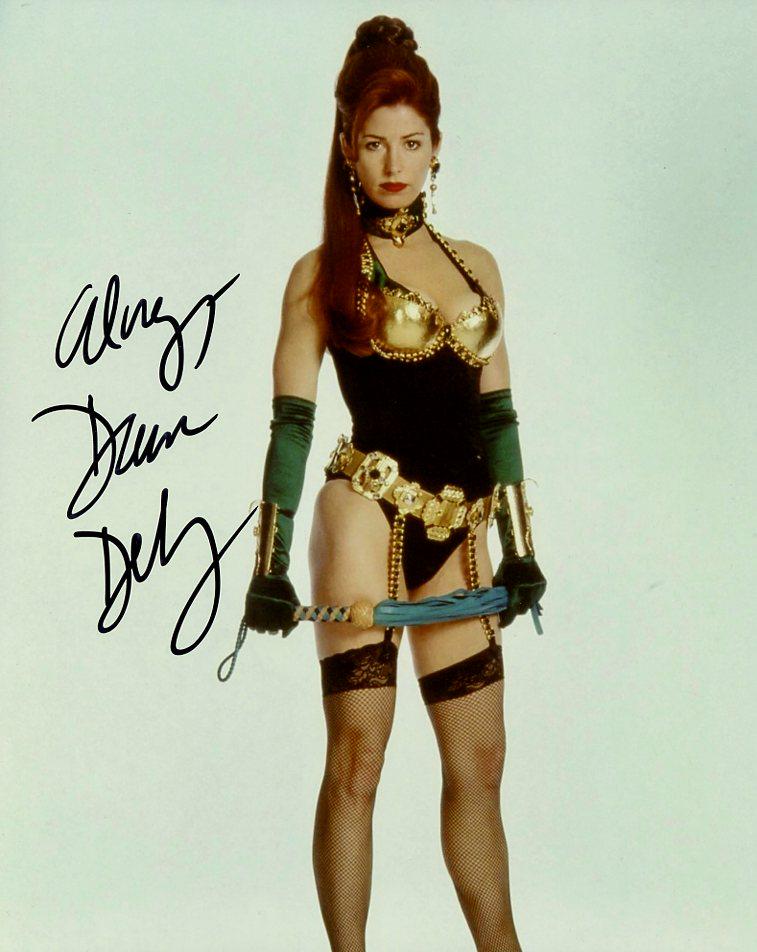 Dana Delany EXIT TO EDEN In Person Signed Photo: Photo size is 8x10. Dana Delany in person signed photo from the movie EXIT TO EDEN. Dana Delany as the character Lisa