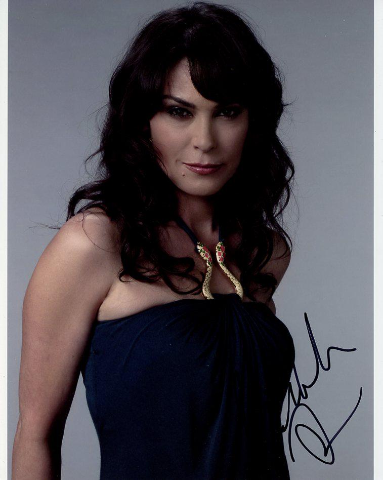 Michelle Forbes TRUE BLOOD In Person Signed Photo: Photo size is 8x10. Michelle Forbes in person signed photo from the TV series TRUE BLOOD. Michelle Forbes as the character Maryann Forrester